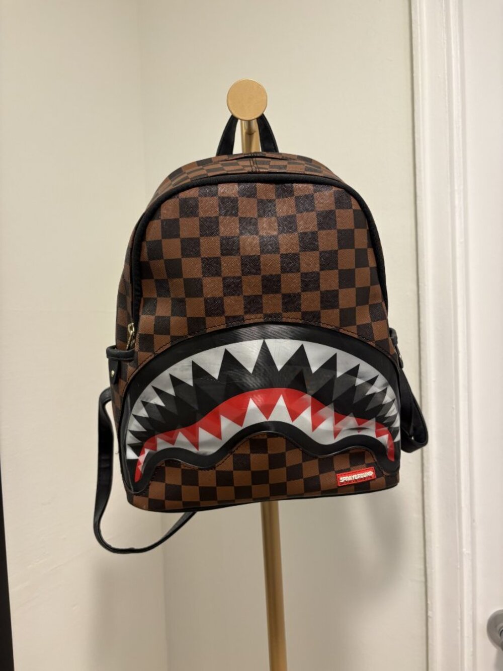 Sprayground brown checkered mini backpack